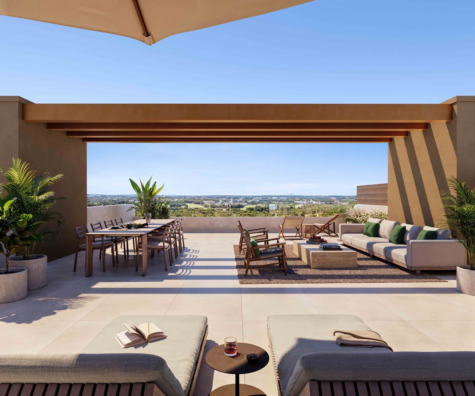 Top-floor apartment terrace looking out over the landscape