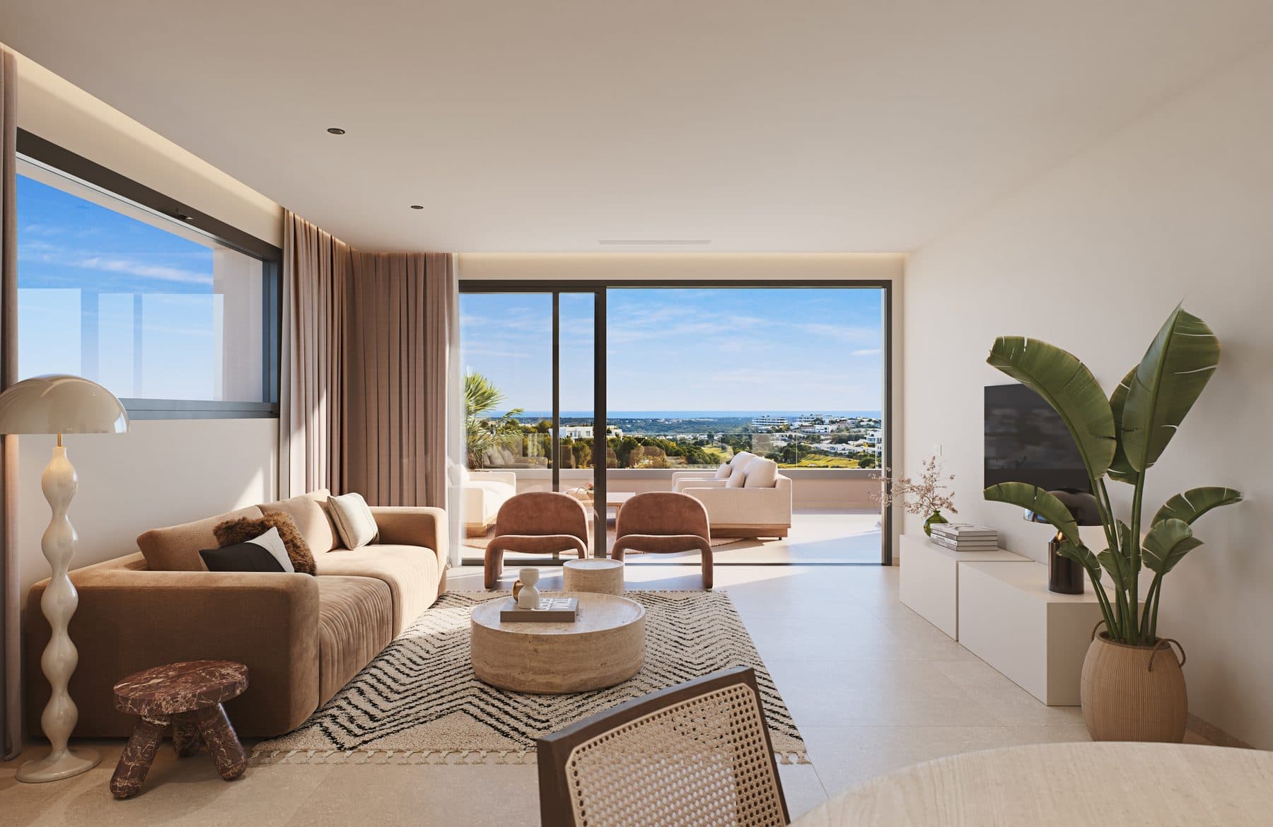 Show apartment living room looking out across the terrace